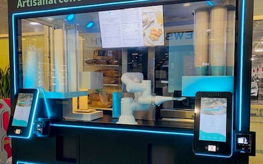 Front of a Barista.Bot kiosk showing the digital menu board and two touchscreens